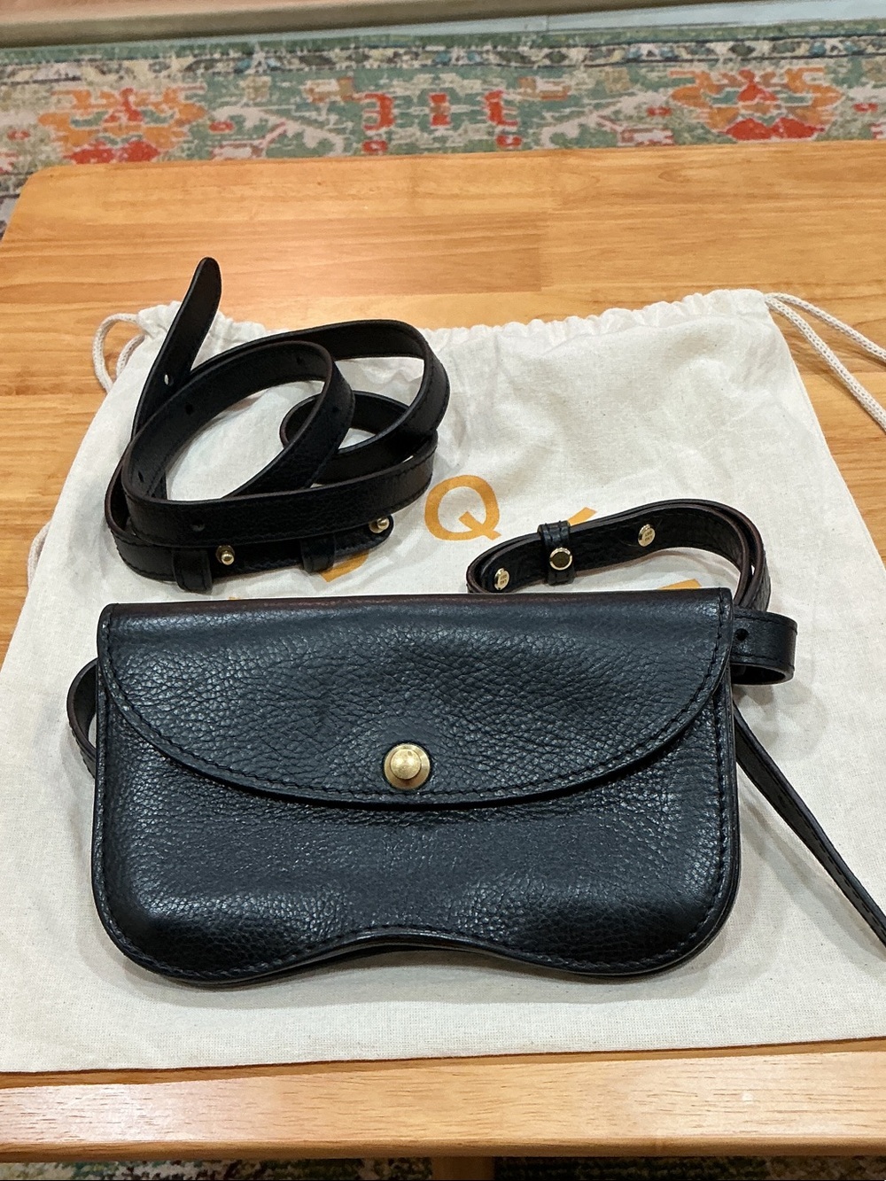Black Pebbled Leather Crossbody with Gold Snap Closure